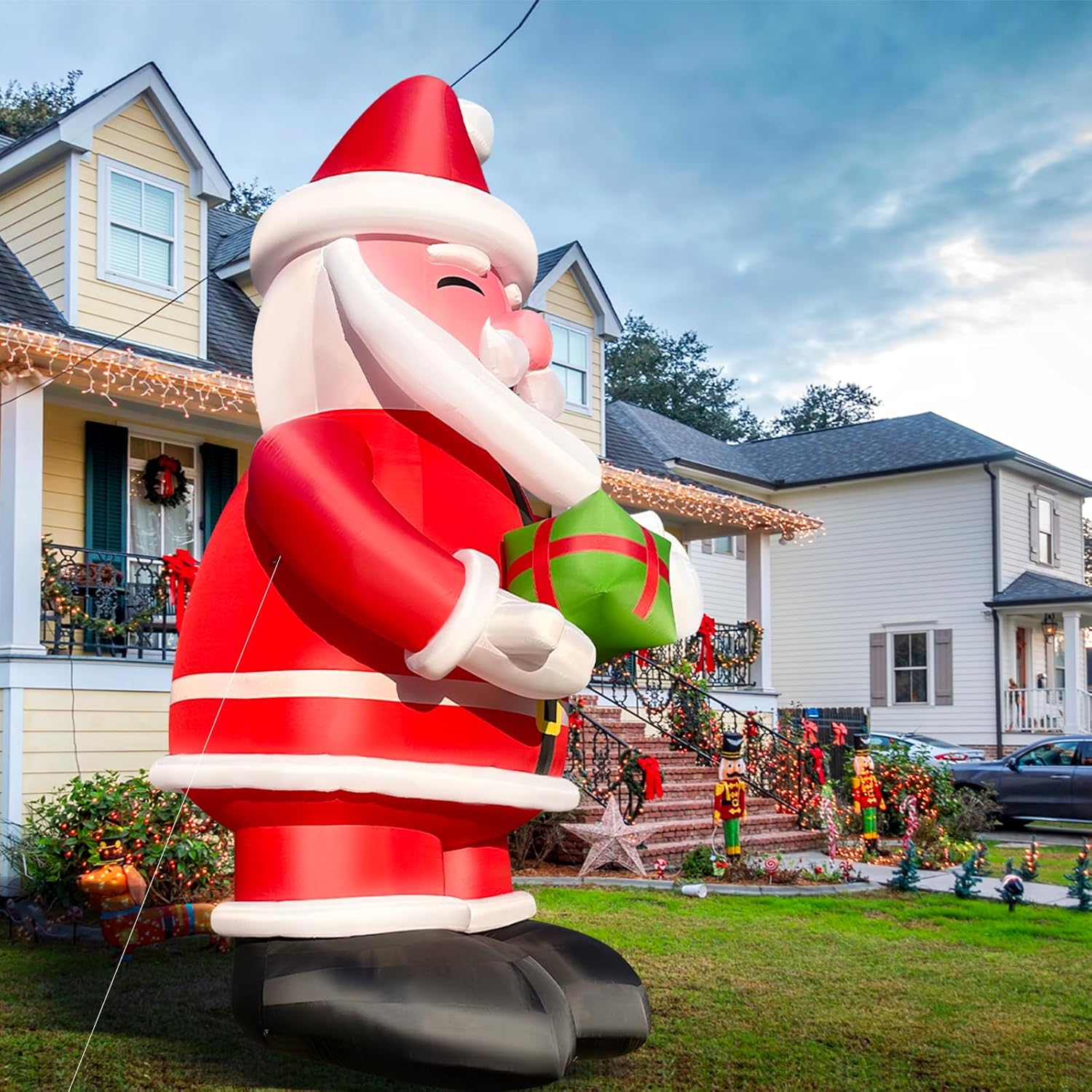 27Ft Tall Inflatable Santa Claus Holding Gift Box Giant Christmas Yard Decoration